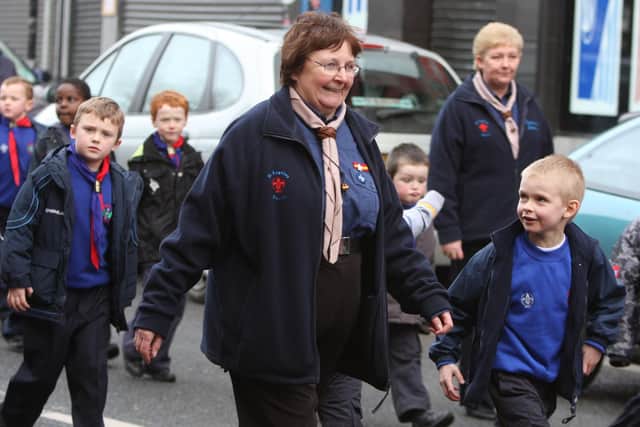 Beaver leader Celine Taylor of St Eugene's Scout Group Derry pictured in years past with some of her Beaver scouts.  (1702JB42)