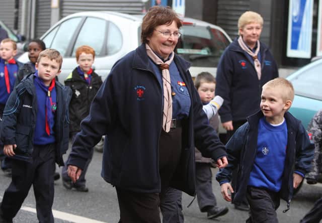 Beaver leader Celine Taylor of St Eugene's Scout Group Derry pictured in years past with some of her Beaver scouts.  (1702JB42)