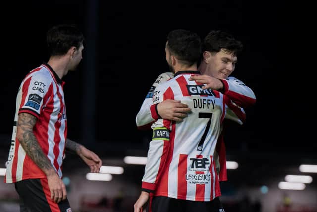Michael Duffy of Derry City celebrates his goal with Ellis Chapman of Derry City and James Clarke of Derry City during the SSE Airtricity Men's Premier Division match between Derry City and Dundalk at The Ryan McBride Brandywell Stadium in Derry. Photo by Matthew Harvey/Sportsfile