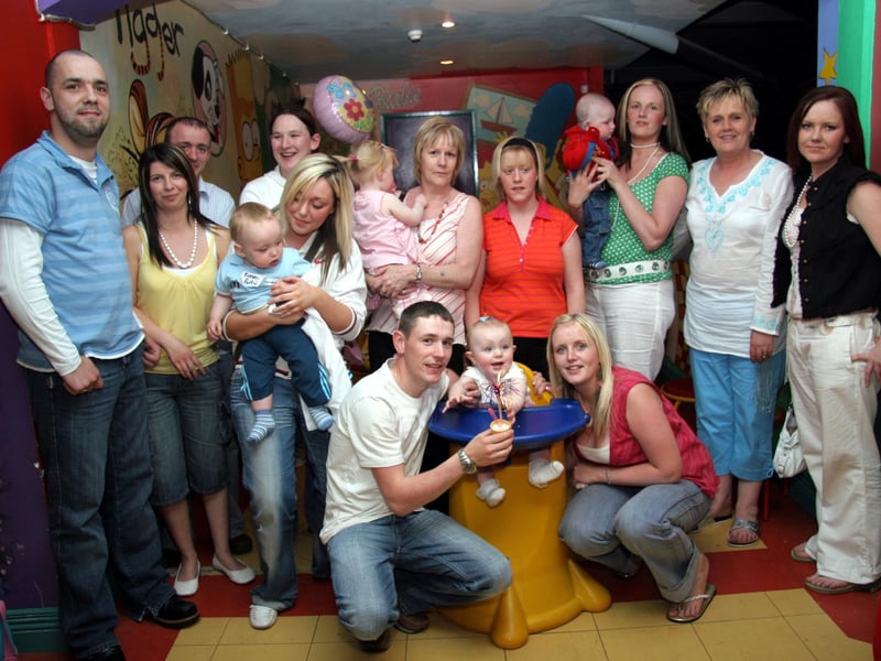 Friends and family join in the birthday celebrations with Kasey on the occasion of her 1st birthday 0542JML : Parties and celebrations June 2006: Casey McCourt.