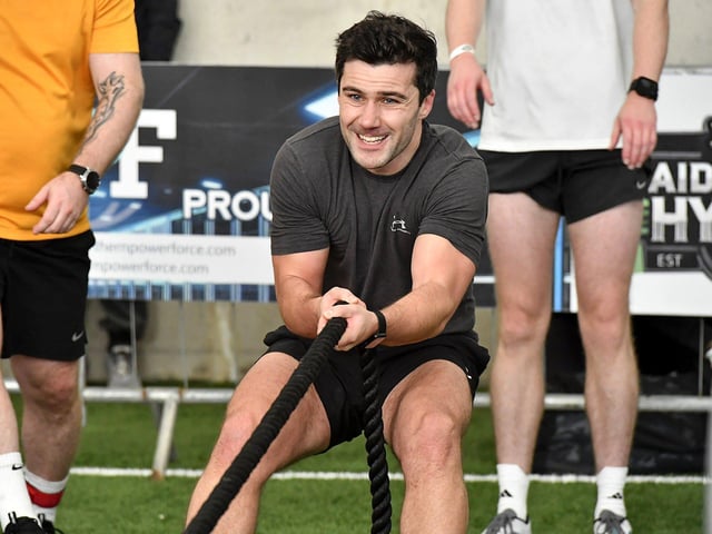 Competitor takes part in the Sled Pull part of the race during the Maiden City Hyrox V Fitness Challenge held at Sean Dolans GAC on Saturday. Photograph: George Sweeney