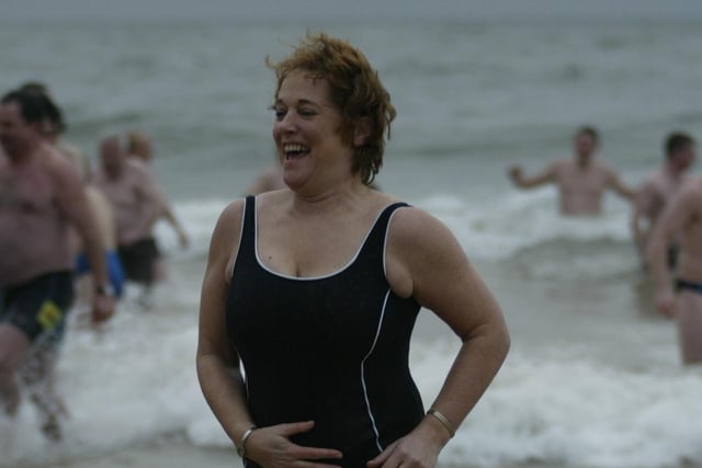 Some like it Hot!!  But some also like it cold as this lady enjoys  the New Year swim at Culdaff.  (0301JB03)