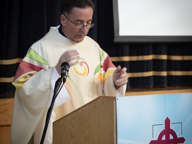 Celebrant Fr. Shaun Doherty addressing the Year 12 Leavers on Wednesday at St. Joseph's Boys School. : .