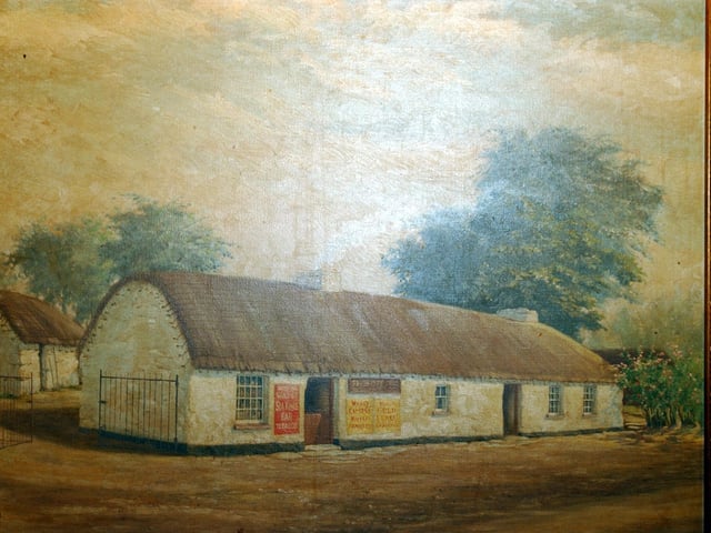 Bygone years, the cottage painting in the The Tul na Rí / Simpson's bar back in January 2003.