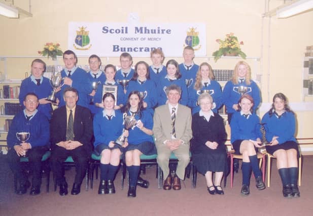 Subject award winners with, seated from left, Frank McHale, Parent's Council, Liam Rainey, principal, and Sister Marie Wylie, Board of Management chairperson. (2005MG02)