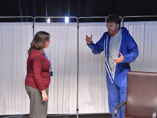 John, who has died by suicide, appears to mortuary make-up artist Jennifer in a liminal space between life and death in Jonathan Burgess’s play Forever and Ever at New Gate Arts and Culture Centre. Photo: George Sweeney