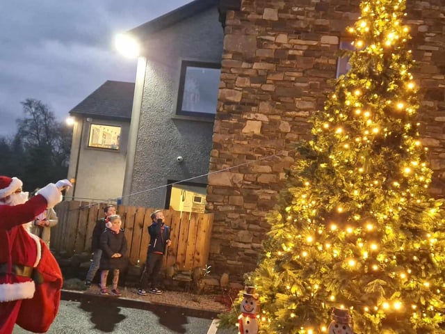 Santa switches on the Christmas tree lights at the Sliabh Sneacht Centre in Drumfries.