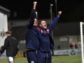 Manager Kevin Doherty (left) and coach Daire Doyle celebrate Drogheda United ‘s win over Derry City. Photograph: George Sweeney