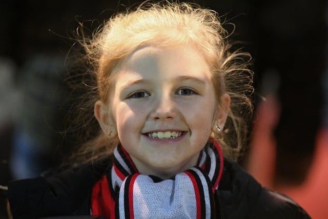 This young Derry City fan is all smiles for our photographer at the Presidents Cup final at Brandywell on Friday evening. Photo: George Sweeney. DER2307GS – 68