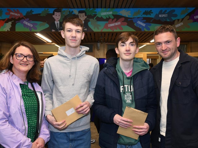 Carmel Bradley pictured with Finn O'Connell and Tony Bradley when they collected their 'A' Level results at St. Columb's College on Thursday morning. Included is Sean Donnelly, teacher.