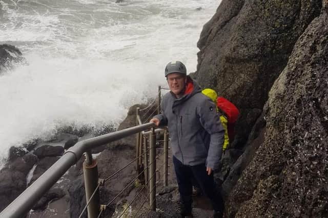 Braving the elements at The Gobbins dramatic coastal cliff walk, especially when Storm Debi had also booked for that day!