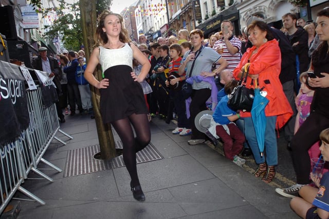 Luna Galligan from Germany entertains crowds on Shipquay Street with Irish dancing yesterday at the Fleadh. (DER3313PG061)