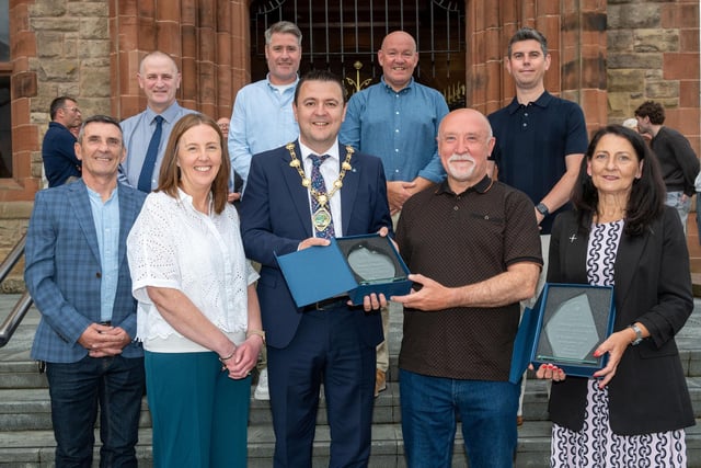 Mr Pádraig Ó Mianáin who is Retiring as Principal of St Brigid's College was the guest of honour at a reception hosted by Derry City and Strabane District Council Mayor, Councillor Ruairi McHugh in the Guildhall. The event also recognised the college’s award of Local Women’s Post-Primary School of the Year. Pádraig has went above and beyond for the community and worked tirelessly to ensure that pupils, regardless of their starting point or background, has the opportunity to succeed. He has a relentless commitment to the local community and a co-education, all ability school which caters for the needs of all pupils. Picture Martin McKeown. 24.06.25
Pictured at the event are members of the Board of Governors, Michael Wilson, Conchur O Braoin, Aisling Mullan, Gareth McAlinden, Gerry McMonagle, Sean McCay and Fiona Kelly
