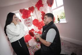 POP THE QUESTION !!!! . . . .Old Romantic Dylan Stafford gets down in one knee to propose to girlfriend Chelsea when they moved in to their new Braidwater Roe Wood home in Limavady on Valentine's Day. (Photo: Jim McCafferty Photography)