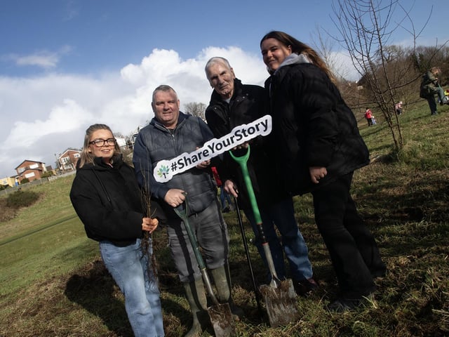 Doing some tree planting on Saturday at Bay Road Park are Megan Anderson, Chris Anderson, Raymond Nixon and Georgia Anderson.