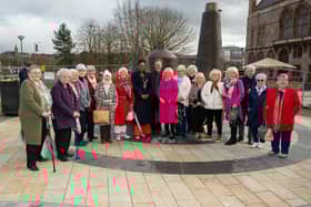 The new Factory Girls Sculpture which has been officially unveiled in Derry’s Harbour Square close to the city’s Guildhall. The sculpture, created by artist Chris Wilson, consists of three anthropomorphic bell shaped forms with nighttime illumination. The design is based on the shapes of spools of thread as used in the shirt factory and celebrates those who worked in the industry. The Mayor, Councillor Lilian Seenoi-Barr, joined Mary White, Chairperson of the Factory Girls and artist Chris Wilson at the unveiling which was attended by some of the women who worked in the local industry and members of the design team. Picture Martin McKeown. 13.03.25