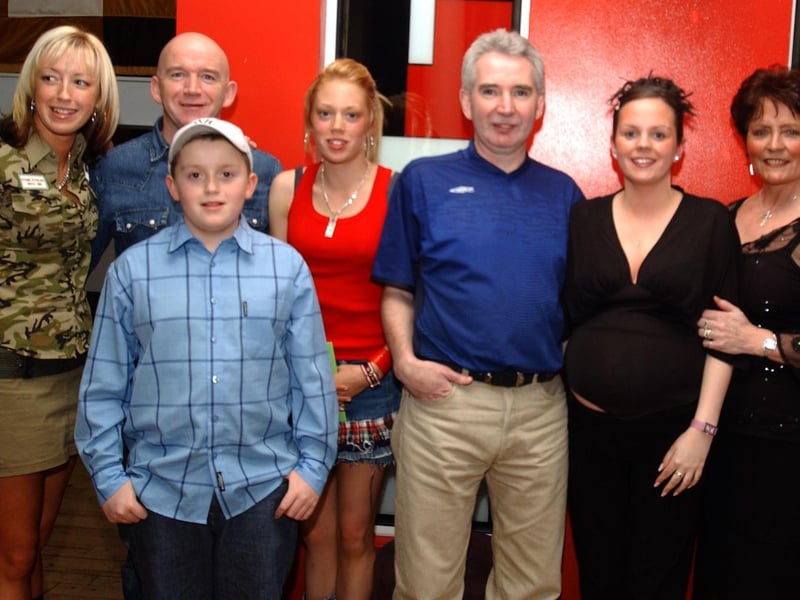 Leanne Curran and Kirstin McLaughlin with their families at Bar Zu on their 18th birthday. Inluded are, Siubhan, Gareth and Danny McLaughlin and Philip and Laoighean Curran and Rose and Paula McGilloway. 