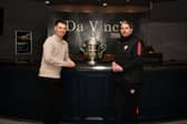 Derry City manager Ruaidhri Higgins pictured with club director Paddy Simpson and the FAI Cup at Da Vinci's Hotel this week.