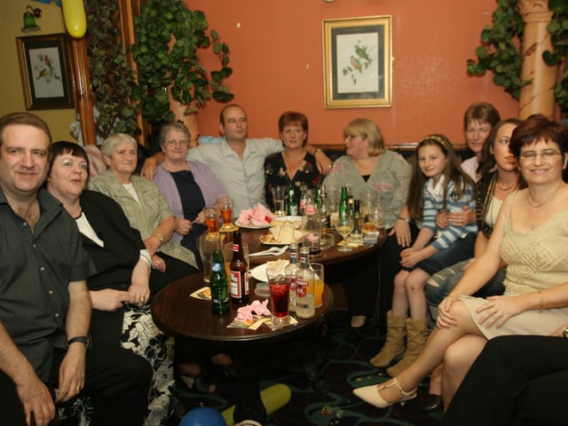 Cathy and Tony celebrate with friends and family, having a few drinks and some pub grub.