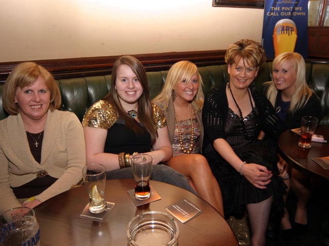 Dolly enjoys a birthday drink with party revellers at Becketts Bar 0047JML