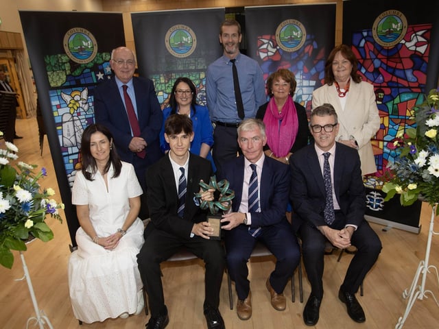 Cathal McNichol receiving the Dr. Michael North Prize for Science from Mr. Niall Downey, guest speaker, at Thursday's St. Columb's College Prizegiving. Included at front is Cathal's parents. At back are Mr. P. Kelly, board of governors, Mrs. C. McLaughlin, Principal, Mr. G. McCay, Head of Chemistry, Ms. M. Hamilton and Mrs. G. Canavan, board of governors.