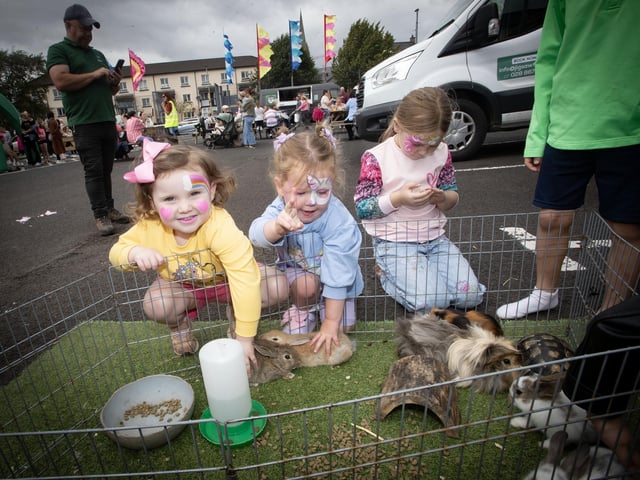 Enjoying the animals at the Feile '25s Party in the Park (Big Bog BBQ) in Pilot's Row on Saturday. (Photos: Jim McCafferty Photography) : .