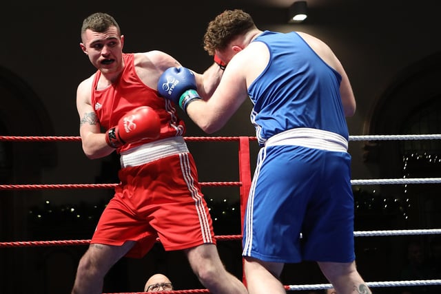 Tom Seaton lands a left on opponent Conal McErlearn at the Ulster Elite Boxing finals. (Photo - Tom Heaney, nwpresspics)