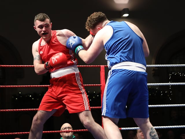 Tom Seaton lands a left on opponent Conal McErlearn at the Ulster Elite Boxing finals. (Photo - Tom Heaney, nwpresspics)