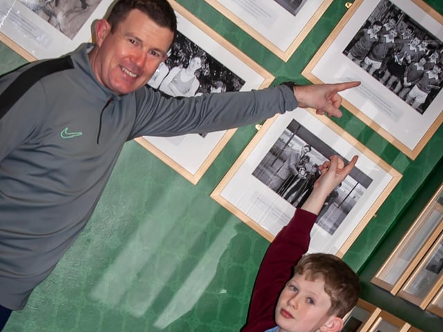 THAT'S ME!. . . .Dad Damien Liddy showing his son Caydn his photo at the St. Joseph's Hall of Fame on Thursday night. (Photos: Jim McCafferty Photography)