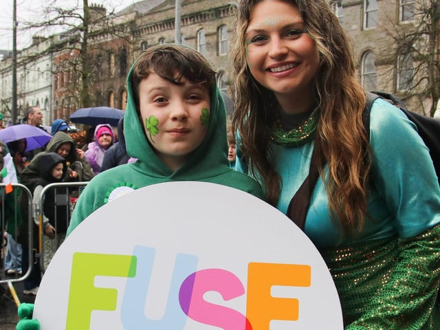Aoife Boyle with her son Noah taking part in the  St. Patrick’s Day Parade. (Photo - Deirdre Heaney, nwpresspics)