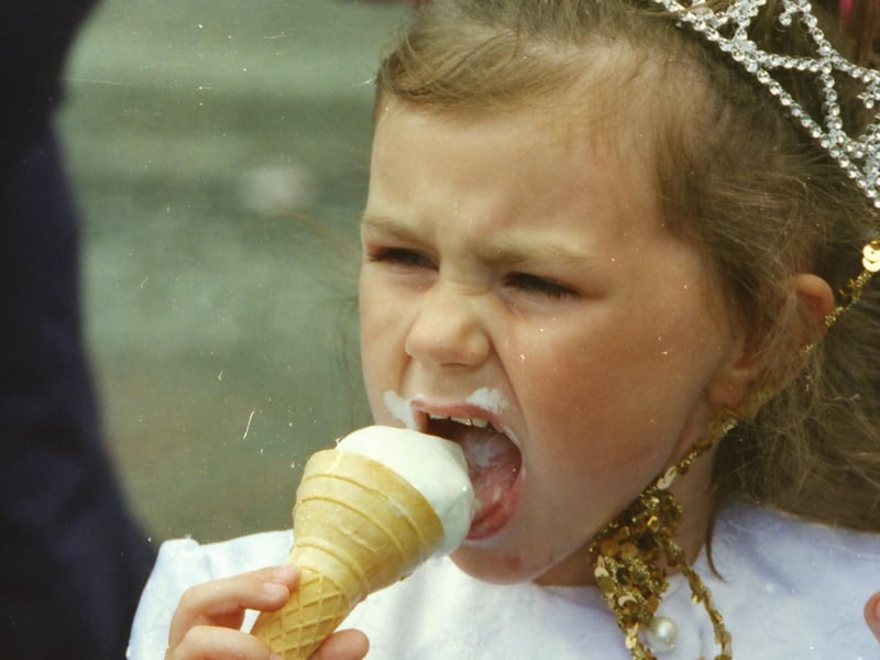 Rebecca Rookley, Creggan Heights, gets tucked into an ice-cream at the Creggan Festival Parade.