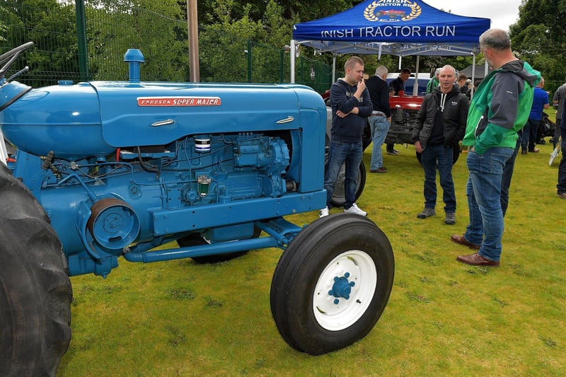 Tractor enthusiasts at the Muff Vintage Show held in the Community Park on Sunday. Photo: George Sweeney.  DER2321GS – 05