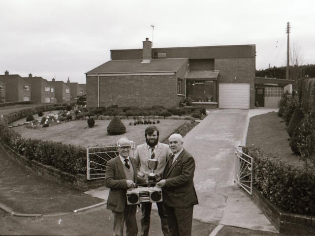 Presentation for best kept garden at Knockwellan Park.