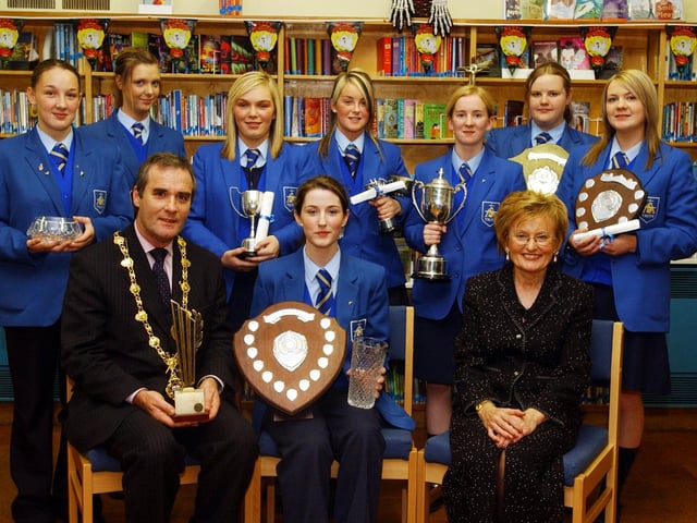The Mayor of Derry, councillor Gearoid O'hEara pictured at the annual prizegiving of St Mary's College. Also seated from left, are Rebecca Durnin, Science, History and Business Studies and Dame Geraldine Keegan, principal. Back from left are, Danielle Ramsay, english award, Elizabeth McCloskey, Convent of Mercy trophy, Erin Doherty, Irish award, Kayleigh mcCormick, Maths, German, and Keyboarding awards, Louise Taylor, Home Economics, Christina Sutherland, Claire Casey Shield, Charelene Sutherland, French award. (1510A15)