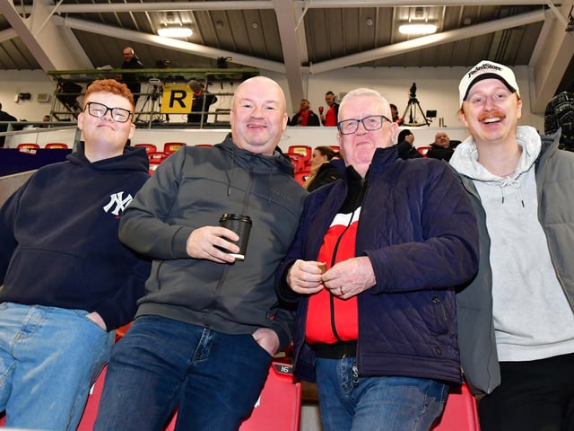 Derry City supporters relaxing before kick-off in the Mark Farren Stand.