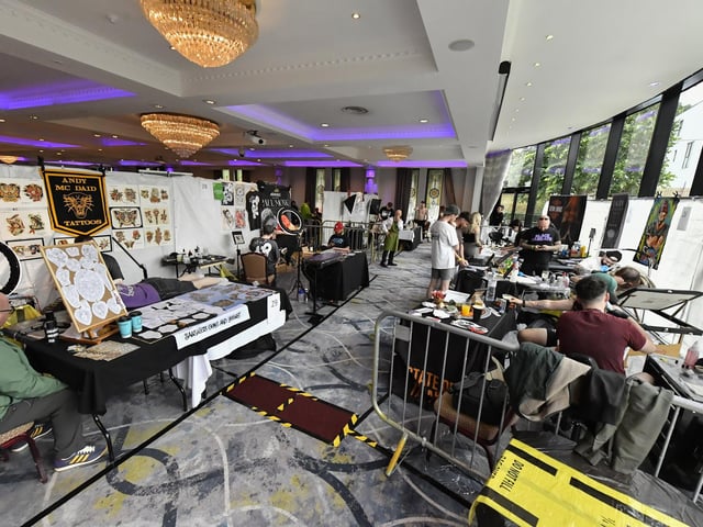 Tattoo artists at the annual Maiden City Ink International Tattoo Convention held in the Everglades Hotel. Photo: George Sweeney