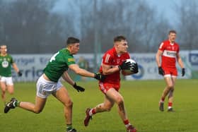 Derry’s Ethan Doherty holds off Meath’s Harry O’Higgins during the recent game at Owenbeg. Photo: George Sweeney. DER2308GS – 57