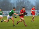 Derry’s Ethan Doherty holds off Meath’s Harry O’Higgins during the recent game at Owenbeg. Photo: George Sweeney. DER2308GS – 57