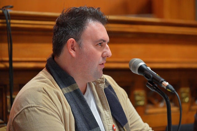 Radio Foyle NUJ representative Dean McLaughlin speaking a public meeting, held in the Guildhall on Wednesday evening, opposing planned cuts to jobs and services at BBC Radio Foyle. George Sweeney. DER2301GS – 19