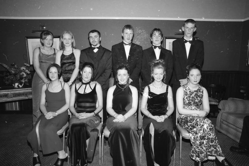 Seated, from left, Lorraine Mooney, Denise O'Donnell, Aisling McLaughlin, Olivia Canny and Catríona Devlin. Standing, from left, Patricia Harkin, Tracey Hewitt, Jim Porteous, Alex McLaughlin, Seamus Sweeney and Martin Harkin. Pictured at the Carndonagh Community School formal in January 1998.