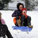 Sunday, November 28th 2010. Snow covered Brooke Park, Derry. Pablo O'Connor and his mum Laura. Picture by Lorcan Doherty / Press Eye