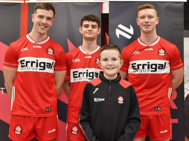 Michael Cassidy, Saint Colm's GAC Drum, pictured with senior players John Mullan (hurling), Patrick McGurk (football) and Marty Bradley (football) at the launch of Derry’s new home and away jersey, for the 2026/2027 season, at O’Neill’s sports store in Waterloo Place on Thursday evening. Photo: George Sweeney