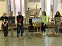 NWRC art students with some of their work, which will among that displayed from Valentine's Day at Eden Arts, Pilot's Row.