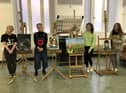 NWRC art students with some of their work, which will among that displayed from Valentine's Day at Eden Arts, Pilot's Row.