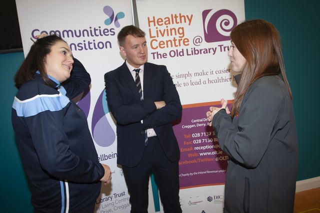 The OLT’s Julie White in conversation with Aisling Hutton, Bogside, Brandywell Health Forum and Padraig Delargy, MLA, during Saturday’s Men’s Health Day at the Old Library Trust, Creggan. 