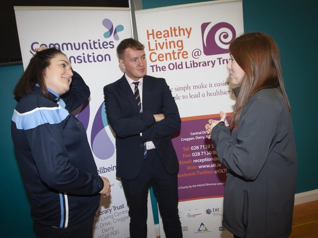 The OLT’s Julie White in conversation with Aisling Hutton, Bogside, Brandywell Health Forum and Padraig Delargy, MLA, during Saturday’s Men’s Health Day at the Old Library Trust, Creggan. 