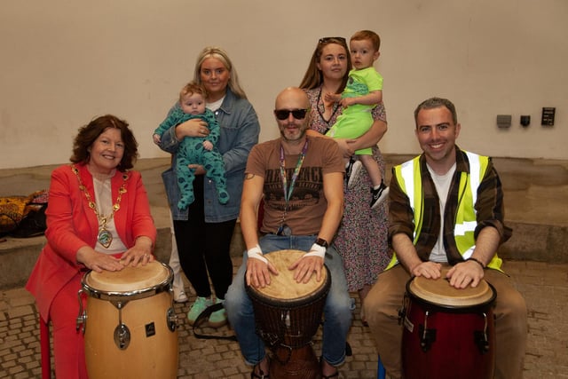 The Mayor, Patricia Logue joins in one of the drumming workshops during Friday's GSAP/Ethos Family Fun Day at Belmont's Playtrail.
