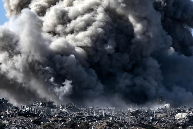 A picture taken from a position near Sderot along the Israeli border with the Gaza Strip shows smoke billowing during an Israeli bombardment on the northern Palestinian territory on November 21, 2023, amid the ongoing battles between Israel and the Palestinian group Hamas. (Photo by FADEL SENNA / AFP) (Photo by FADEL SENNA/AFP via Getty Images)