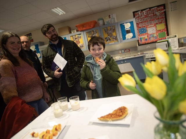 Caolan Madden enjoying some pizza during a visit to the HE Department at Oakgrove on Tuesday.