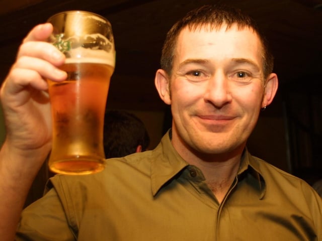 Davidn Holden celebrates his 40th birthday with a pint of his favourite tipple. (2503JM10):.